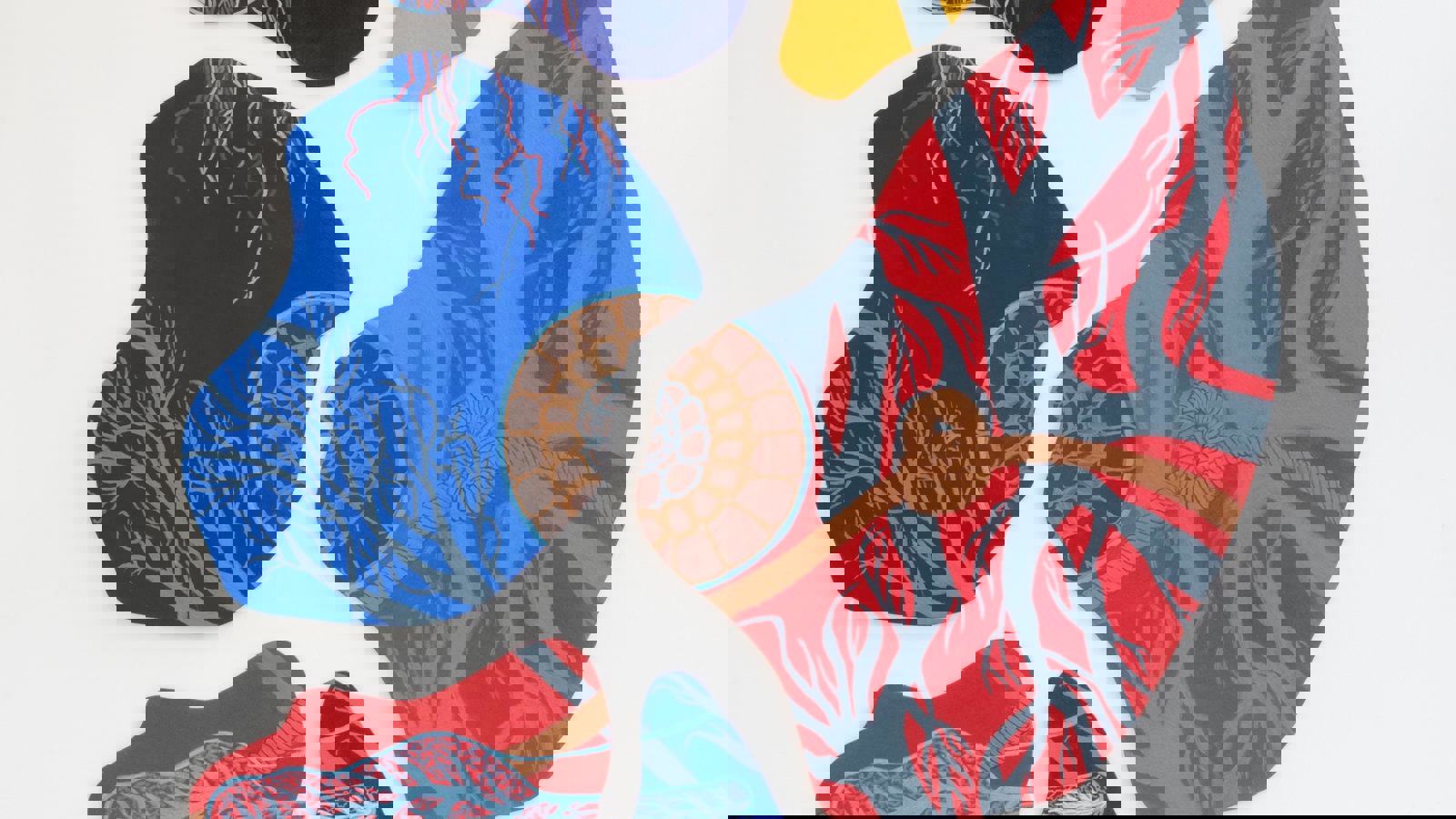 An abstract wall installation made of several irregular, organic‑shaped panels hangs against a white gallery wall. Each panel is filled with intricate patterns that resemble branching vessels, roots, or cellular structures, painted in vivid reds, blues, yellows, and browns. One section features a knot‑like form connected to red branching lines, giving the piece a sense of biological interconnectedness. The overall effect is vibrant, textured, and evocative of natural systems