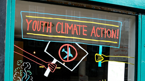 Swap Market's window, showcasing a climate action display