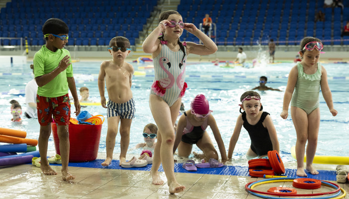 Children take part in Learn to Swim activities during a celebration at Glasgow Club Tollcross.